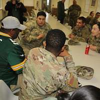 File:US Navy 110216-N-DR144-199 William Henderson, a fullback for the Green  Bay Packers football team, speaks with an aviation ordnanceman on the  flight.jpg - Wikimedia Commons