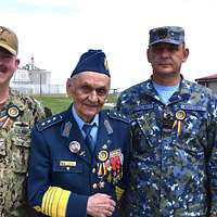 Lt. Gen. Thomas Spoehr, right, Director, Army office of Business  Transformation, Office of the Under Secretary of the Army, meets Willie  Young, Chicago Bears Linebacker, during the Chicago Bears Veterans Day at