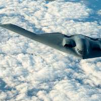 B-2 Spirit performs a flyover before AFC Divisional Playoff game 